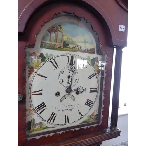 287 - An early 19th century mahogany and boxwood-strung eight-day longcase clock; the broken swan-neck ped... 