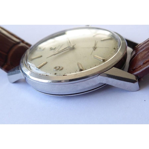 292 - A gentleman's Omega Seamaster steel-cased wristwatch; the signed dial with baton markers and Arabic ... 