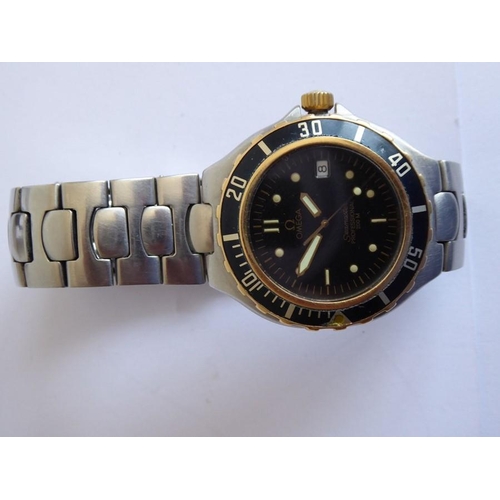 295 - A gentleman's Omega Seamaster Professional 200 M steel-cased wristwatch; gold coloured and black rot... 