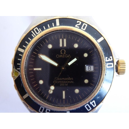 295 - A gentleman's Omega Seamaster Professional 200 M steel-cased wristwatch; gold coloured and black rot... 