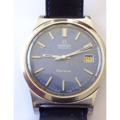 299 - A gentleman's steel-cased Omega Automatic Geneva wristwatch; the blue signed dial with baton markers... 