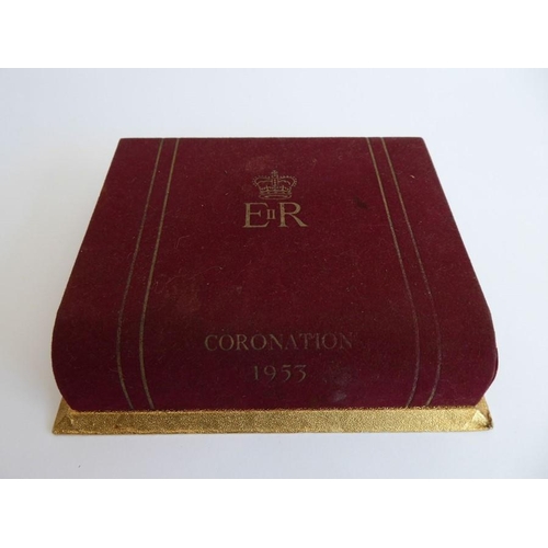 321 - A mid-20th century boxed double set of playing cards produced to commemorate the Coronation in 1953