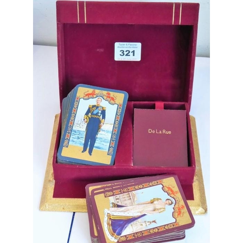 321 - A mid-20th century boxed double set of playing cards produced to commemorate the Coronation in 1953