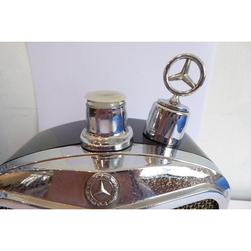 321A - An unusual mid-20th century novelty flask modelled as a Mercedes Benz chromed radiator; of angular f... 