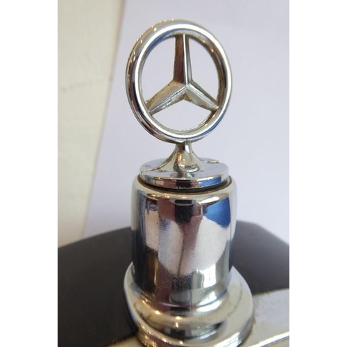 321A - An unusual mid-20th century novelty flask modelled as a Mercedes Benz chromed radiator; of angular f... 