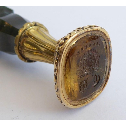 324 - An early 19th century yellow-metal seal, tapering octagonal green hardstone handle, engraved citrine... 