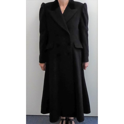 324A - A lady's black pure wool riding-style coat by Laura Ashley; with black velvet collar and UK size 14,... 