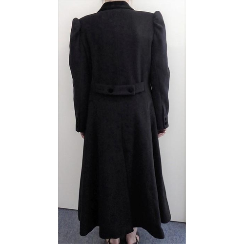 324A - A lady's black pure wool riding-style coat by Laura Ashley; with black velvet collar and UK size 14,... 