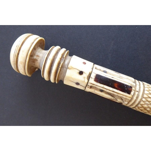 330 - A 19th century carved and tortoiseshell inlaid walking cane fashioned from a Narwhal tusk; the turne... 