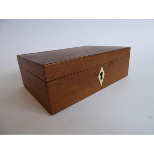 346 - A small 19th century wooden box (possibly cedarwood ?) having a kite-shaped bone escutcheon and cont... 