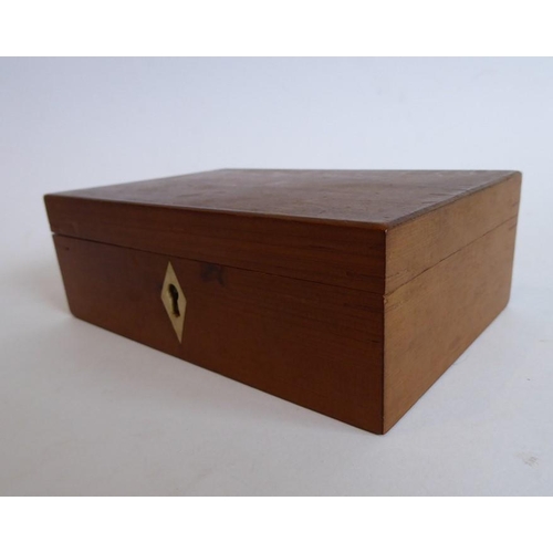 346 - A small 19th century wooden box (possibly cedarwood ?) having a kite-shaped bone escutcheon and cont... 