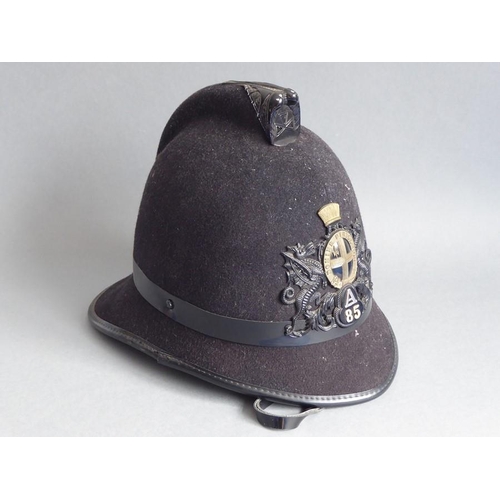 356 - A police helmet City of London Police together with accompanying paper letter dated 21st July 2000 '... 