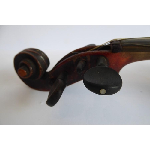 359 - A 19th century cased violin (later bow); the dark and patinated instrument with tightly carved scrol... 