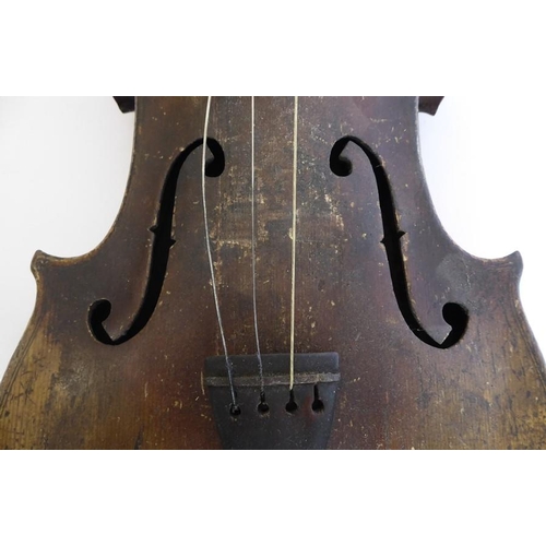 359 - A 19th century cased violin (later bow); the dark and patinated instrument with tightly carved scrol... 