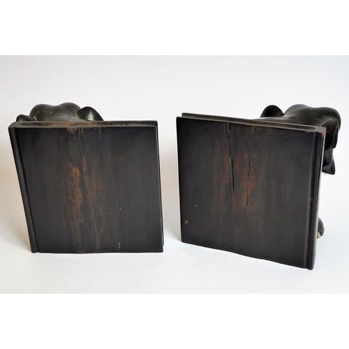 365 - A pair of early 20th century heavy early ebony bookends modelled as African elephants (16cm wide x 1... 