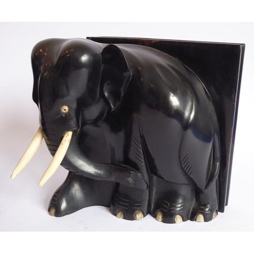 365 - A pair of early 20th century heavy early ebony bookends modelled as African elephants (16cm wide x 1... 