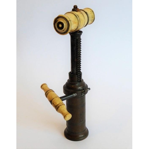 368 - A 19th century Thomason Dowler barrel-shaped corkscrew; turned bone handle (minus brush), rack and p... 