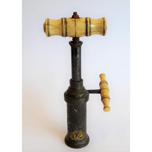 368 - A 19th century Thomason Dowler barrel-shaped corkscrew; turned bone handle (minus brush), rack and p... 