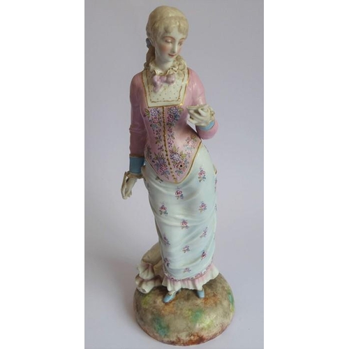 37 - Two large hand-decorated Continental porcelain figure models; each with hair tied back and respectiv... 