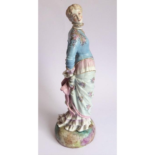 37 - Two large hand-decorated Continental porcelain figure models; each with hair tied back and respectiv... 