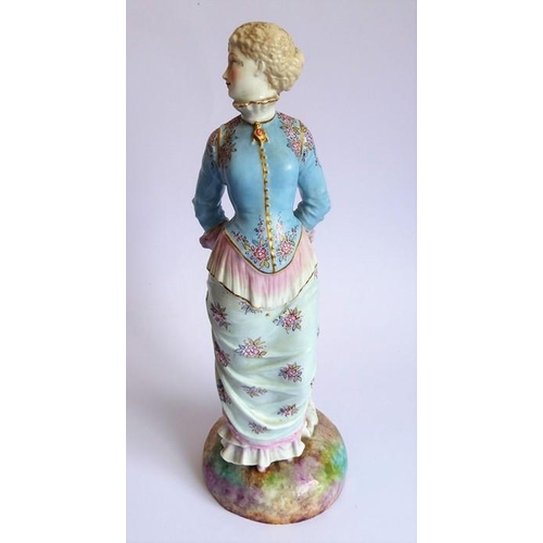 37 - Two large hand-decorated Continental porcelain figure models; each with hair tied back and respectiv... 