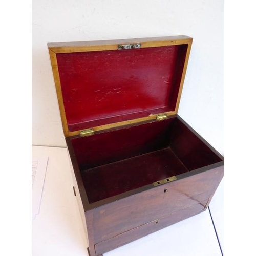 373 - A George III-period mahogany strung and satinwood crossbanded table box; the hinged lid opening to r... 