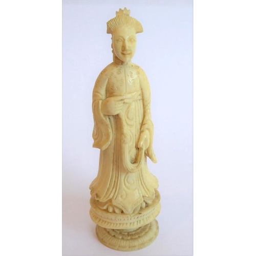 382 - A good selection of late 19th century carved and set stained ivory chess pieces to include seven whi... 