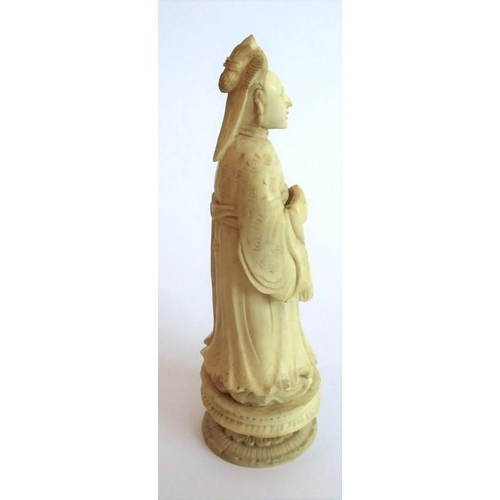 382 - A good selection of late 19th century carved and set stained ivory chess pieces to include seven whi... 