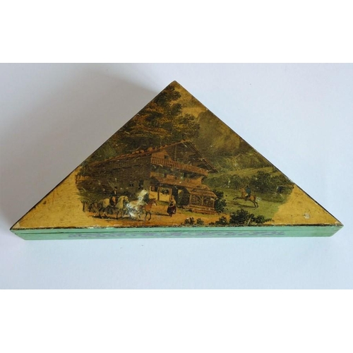 384 - A triangular late 19th century boxwood/balsawood box; the lid with a topographical scene of horse ri... 