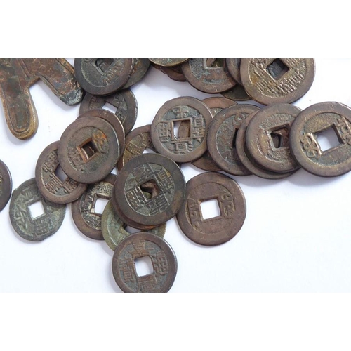 389 - A selection of various old Chinese coinage of different sizes and shapes and with square holes throu... 