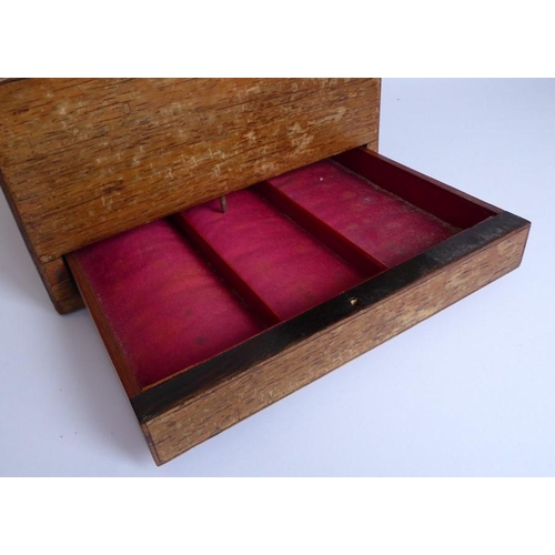 395 - A mid 19th century faded rosewood and mother of pearl inlaid vanity case; the lid opening to reveal ... 