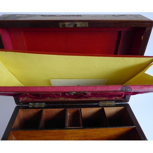 395 - A mid 19th century faded rosewood and mother of pearl inlaid vanity case; the lid opening to reveal ... 