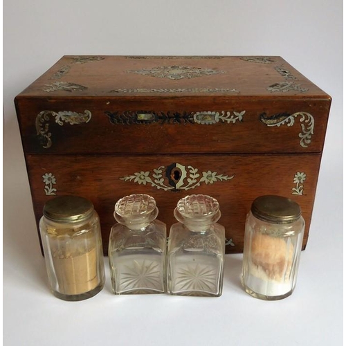 395 - A mid 19th century faded rosewood and mother of pearl inlaid vanity case; the lid opening to reveal ... 