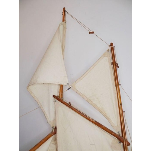 400 - A fine early to mid-20th century six-sail custom-built pond yacht on stand; complete with £530 recei... 