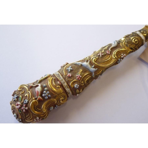 405 - An unusual 19th century gilt-metal letter opener; the flat pointed blade locating into a finely cast... 