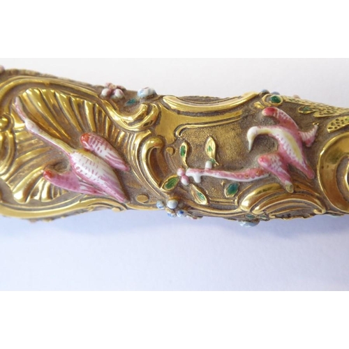 405 - An unusual 19th century gilt-metal letter opener; the flat pointed blade locating into a finely cast... 