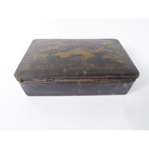 409 - A late 19th century French papier-mâché snuff box; the hinged lid decorated with a deer hunting scen... 