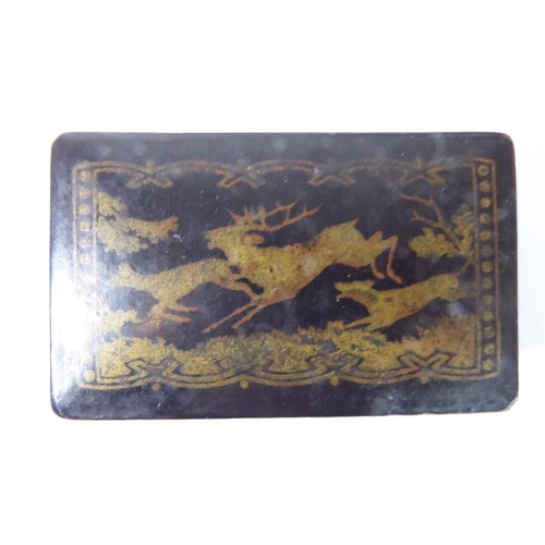 409 - A late 19th century French papier-mâché snuff box; the hinged lid decorated with a deer hunting scen... 