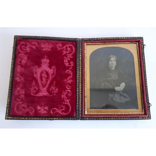 412 - A selection of two 19th century photographs (Ambrotypes/Daguerreotypes), two female subjects each wi... 