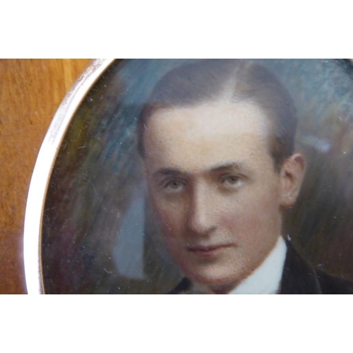 423 - An early 20th century oval shoulder-length portrait miniature; rose-gold-coloured oval frame, the ge... 