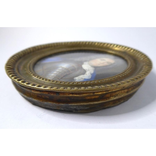 426 - A fine oval brass-cased shoulder-length 17th-century-style (possibly period) portrait miniature; the... 