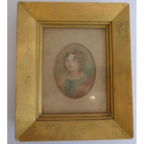 427 - A early to mid-19th century watercolour shoulder-length portrait of a young girl with curly blonde h... 