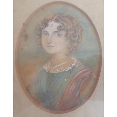 427 - A early to mid-19th century watercolour shoulder-length portrait of a young girl with curly blonde h... 