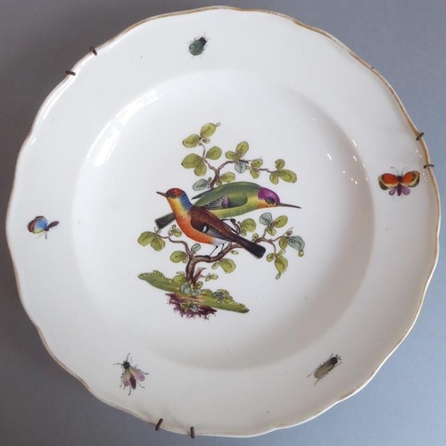 45 - A long and rare set of 36 late 19th century Meissen porcelain dishes; each with shaped gilded border... 