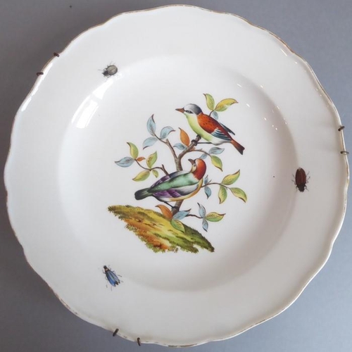 45 - A long and rare set of 36 late 19th century Meissen porcelain dishes; each with shaped gilded border... 