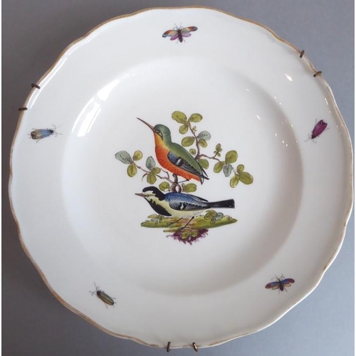 45 - A long and rare set of 36 late 19th century Meissen porcelain dishes; each with shaped gilded border... 