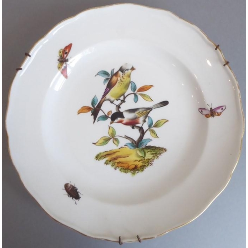 45 - A long and rare set of 36 late 19th century Meissen porcelain dishes; each with shaped gilded border... 