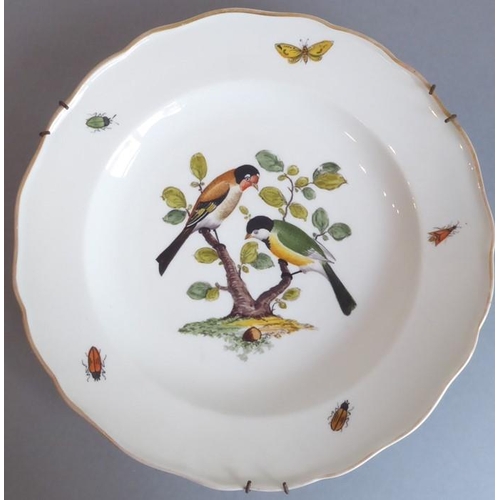 45 - A long and rare set of 36 late 19th century Meissen porcelain dishes; each with shaped gilded border... 