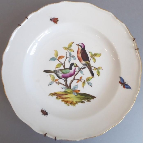 45 - A long and rare set of 36 late 19th century Meissen porcelain dishes; each with shaped gilded border... 