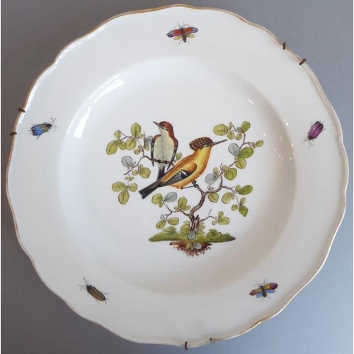 45 - A long and rare set of 36 late 19th century Meissen porcelain dishes; each with shaped gilded border... 